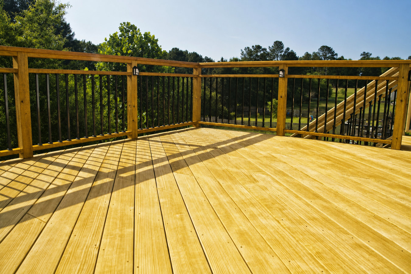 Pressure-treated wood deck construction